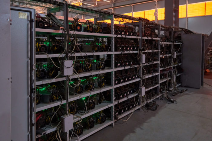 These ASIC Miners are used to mine cryptocurrency. They may be mining Bitcoin, Ethereum, Monero, or a number of other coins.